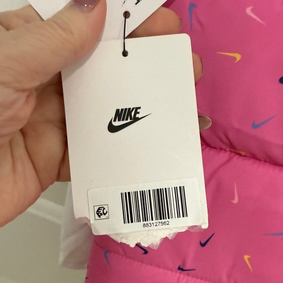 Nike Pink Puffer Vest with White Shirt and Blue Leggings - Picture 6 of 7